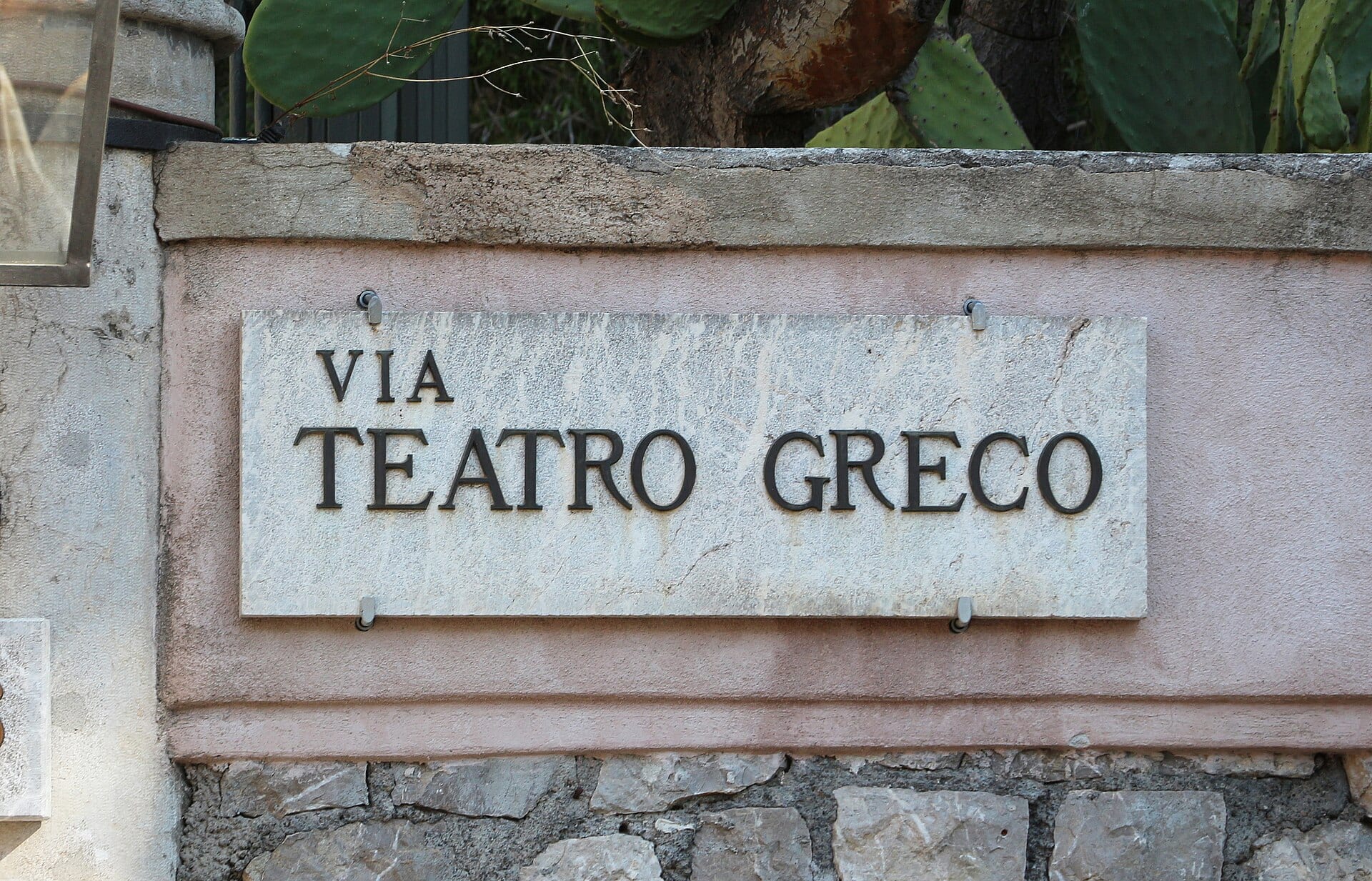Ancient Greek Theatre in Taormina with Mount Etna beyond